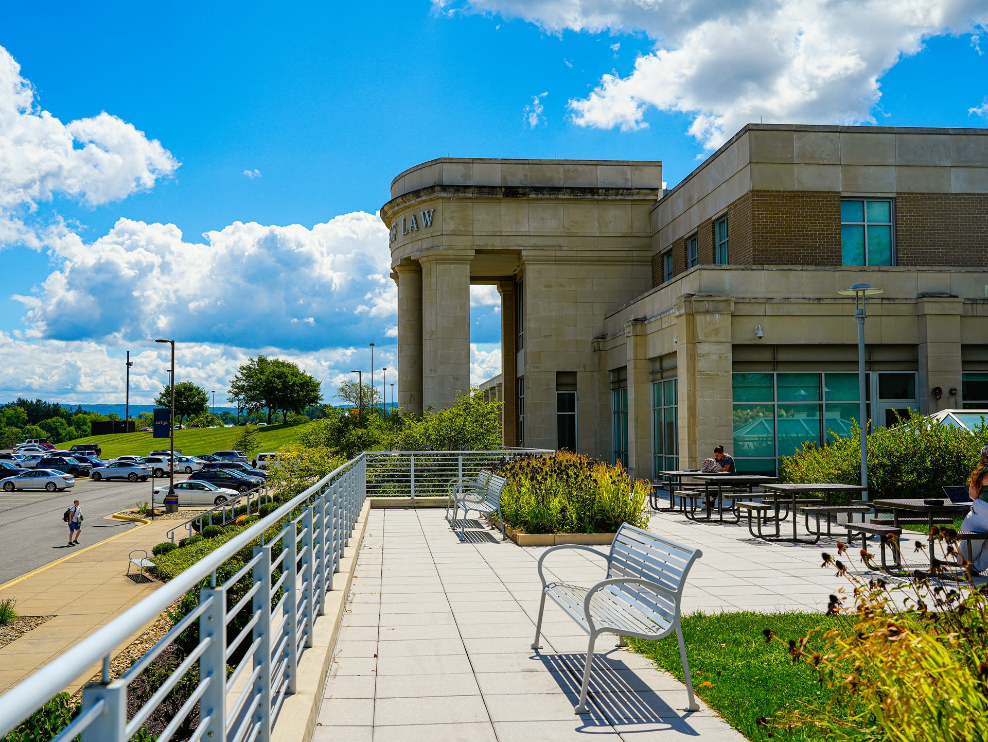 Side view of the main entrance of the WVU College of Law building.