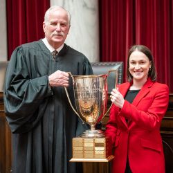 WVU Law 2022 Baker Cup winner with West Virginia Supreme Court Chief Justice Hutchison
