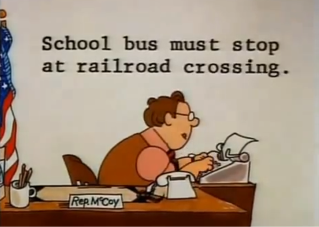 School bus must stop at a railroad crossing.