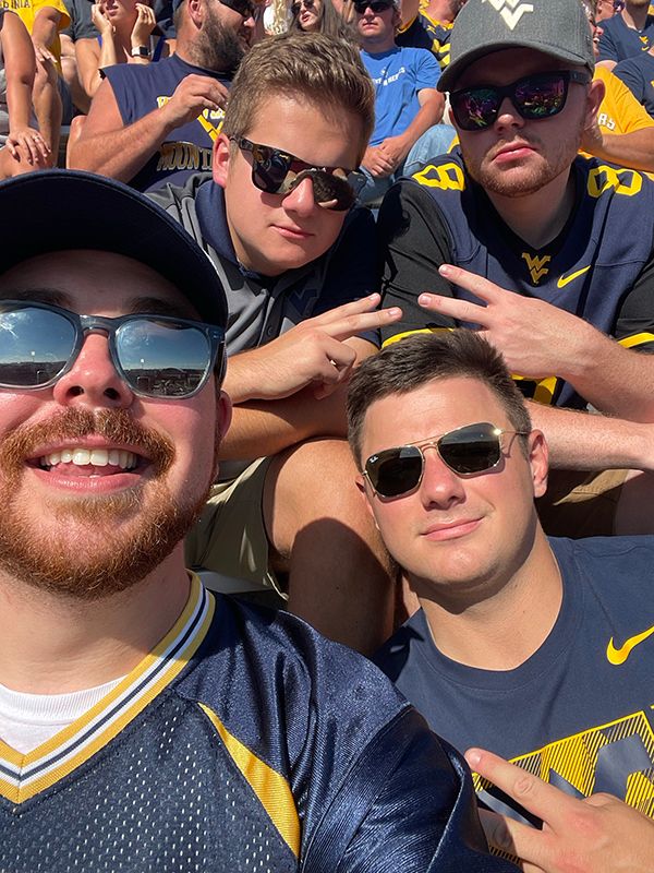 Jared Phalen and friends at a football game.